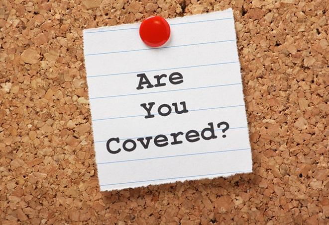 motorcycle insurance agent assisting a client in South Lyon